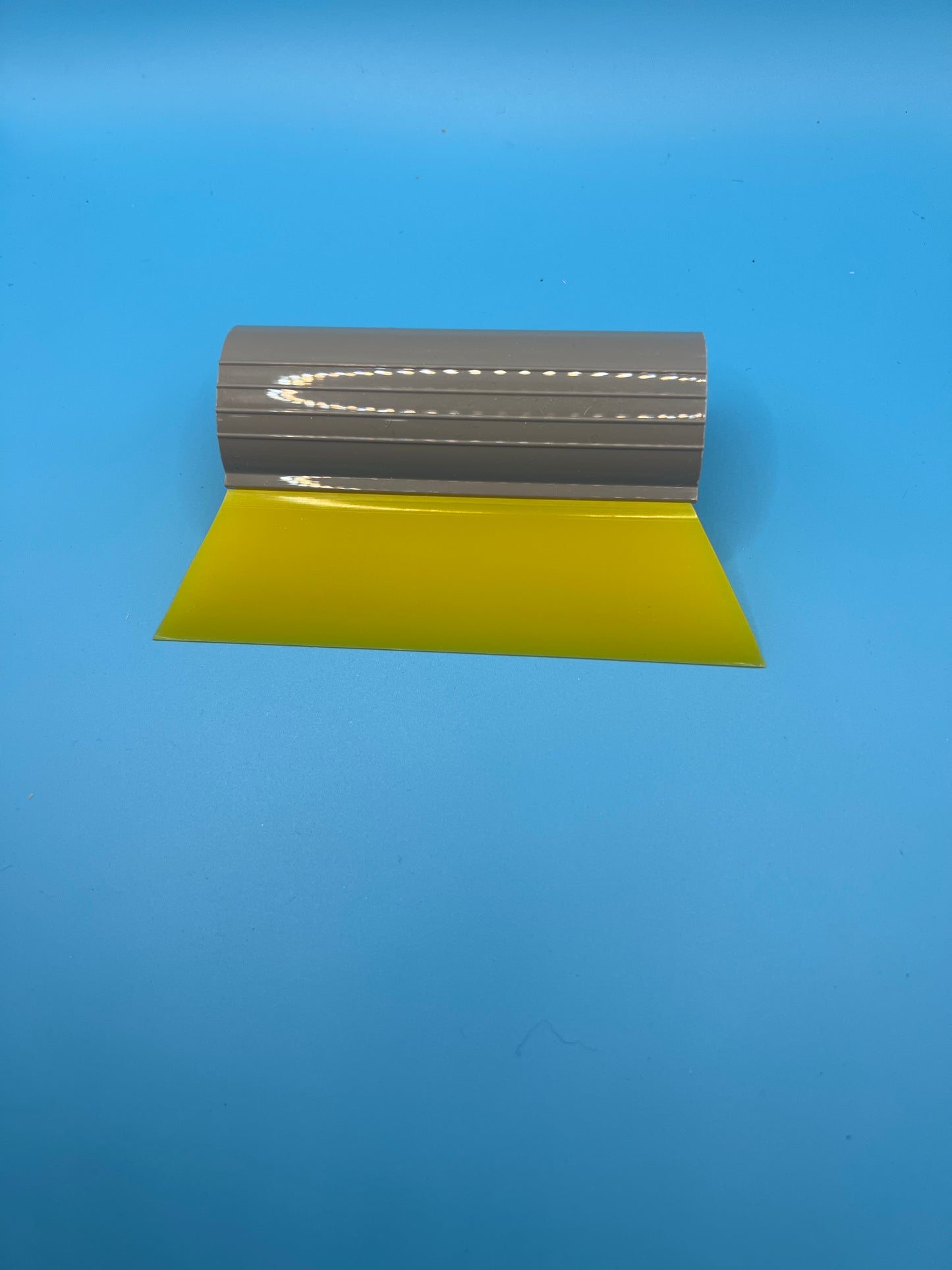 5” yellow squeegee with plastic grip